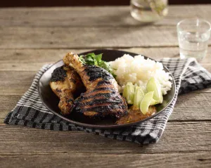 Vindaloo and mango chutney grilled chicken Marylands served with steamed rice, fresh coriander and lime wedges